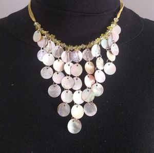Reversible cascading shell necklace